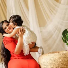 A sweet kiss for mom. We love capturing these spontaneous displays of affection between parents and their children during our toddler and sitter sessions.
