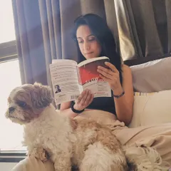 Quiet moments reading a book with my dog, Shifu. I believe in sharing the knowledge and realizations I gain, because you never know who is seeking those answers. We are all connected.