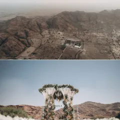 The top half of this image is a drone shot showing the wedding venue set against a vast, mountainous desert landscape, highlighting the epic scale of this destination wedding.