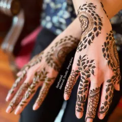A gorgeous and airy design with leafy vines, perfect for a guest or for someone who prefers a more modern, less dense mehendi style.