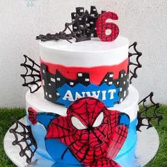 Your friendly neighborhood Spider-Man swings into the party with this exciting two-tier cake. We captured the cityscape in fondant and chocolate, with Spidey himself ready for action, making it a hit for any superhero fan.
