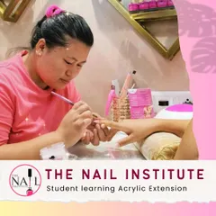 With intense focus, this student is learning the precise techniques for applying acrylic extensions at our Borivali branch.