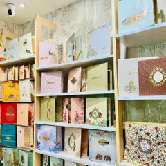 Our shelves are filled with a wide variety of designs, from luxurious boxed invitations to elegant modern cards. There's something for every style and budget.