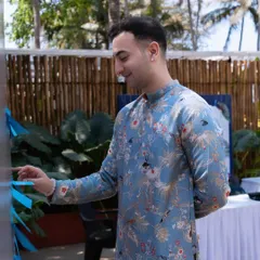 Interacting with an installation at a 'Sitar for Mental Health' event in Goa.