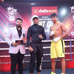 Posing with a winner at a United Professional Boxing event hosted at our academy. We bring high-level boxing to our community.