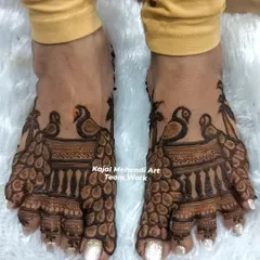 We also do beautiful foot mehndi for the wedding party. This peacock design for the feet complements the hand mehndi perfectly.