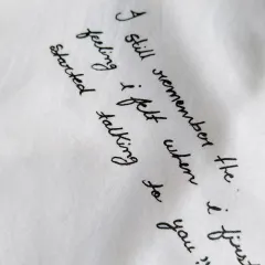 I love adding personal quotes to my custom shirts. This one, "I still remember the feeling I felt when I first started talking to you," captures the magic of the beginning of a relationship.