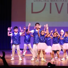 Our little stars shining bright on the big stage! This kids' group performance shows the confidence and joy we nurture in our youngest dancers. Seeing them own the stage in their sequined costumes is what makes it all worthwhile.