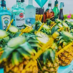 For a tropical-themed party, we served cocktails directly in hollowed-out pineapples. This not only looks fantastic but also infuses the drink with fresh, natural pineapple flavor.