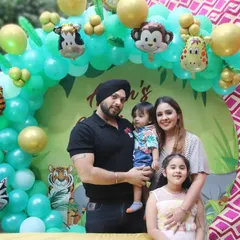 A fun family portrait at a jungle-themed birthday party. I capture posed group shots against the beautiful decor you've planned, ensuring you have a perfect picture with your loved ones.