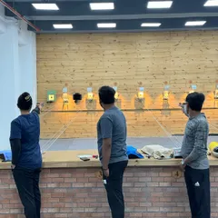 Our pistol shooting lanes where athletes practice their stance and trigger control. We provide a spacious and well-lit environment for focused training sessions.