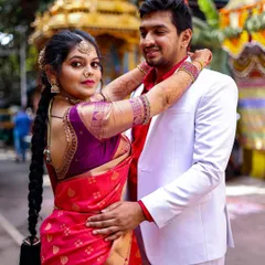 An outdoor couple shoot with a traditional temple chariot in the background. I enjoy finding unique backdrops that add cultural context and visual interest to your photos.