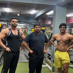 Just training. Focus, dedication, and patience are the keys to results. Here with two of my dedicated lads.