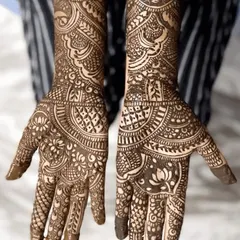 Look at the confidence in this student's work. The design features intricate patterns and perfectly balanced lotus motifs, all learned during the course.