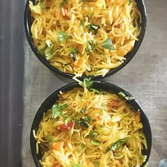 Two bowls of my homemade vegetable vermicelli (seviyan upma). It's a light, healthy, and tasty breakfast option.