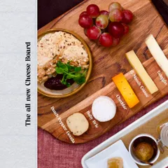 Our all-new Cheese Board, a celebration of artisanal cheese. We feature a curated selection including Dutch Pepper Gouda, 15-Month Comte, and a beautiful Baby Brie from our friends at Begum Victoria.