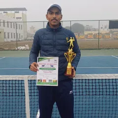 Navya Yadav holding his trophy from the Asian U-16 Tournament. Competing and winning at this level requires immense dedication, and I am proud of the perseverance he has shown.