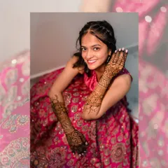 A beautiful shot of the bride showing off her intricate mehendi design. The henna is a key part of the bridal look, and we make sure to capture its beauty.