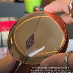 My favorite setting powder: Charlotte Tilbury Airbrush Flawless Finish. It's known for blurring imperfections and reducing shine, giving a soft-matte finish that looks incredible on camera and in person.