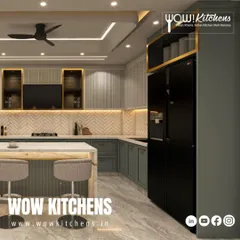 This view showcases the tall pantry and refrigerator housing, demonstrating how we create ample storage while maintaining a sophisticated and uncluttered aesthetic in our luxury kitchen designs.