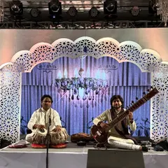 A classic sitar and tabla jugalbandi at the iconic Taj Mahal Palace, Mumbai. This setup is ideal for creating an atmosphere of elegance and sophistication, perfect for exclusive gatherings and wedding events.