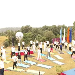 Another angle from our large-scale yoga event, showing the vibrant and energetic atmosphere. We believe in making yoga accessible and enjoyable for everyone in the community.