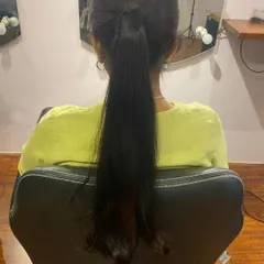 The after-shot of a client with a full, long ponytail created using my 100% human hair ponytail extension.