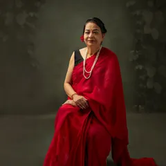 I feel so blessed to have this amazing woman as my mother-in-law. Her kindness and support are a gift, and capturing her grace and elegance in this beautiful red saree was an honor.