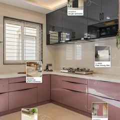 For a touch of modern glamour, this kitchen combines dusty pink and dark grey acrylic laminates. The look is completed with a marble-look quartz countertop and glossy backsplash tiles, creating a space that is both chic and functional.