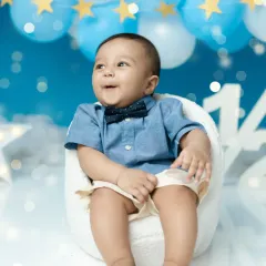Celebrating the half-year mark. This little boy is looking dapper with his bowtie in our 'twinkle twinkle little star' themed half-birthday shoot.