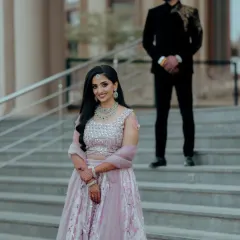 A beautiful reception look in a pastel lehenga. I kept the makeup soft and radiant with gentle waves in her hair for a modern, romantic feel.