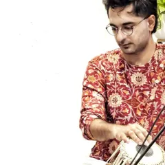 A candid shot while playing with Vinay Desai bhai. These performances are as much about the connection between the artists as they are about the music itself.