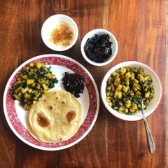 A healthy and wholesome lunch plate featuring my Aam ki Mithi Chutney. This sweet mango chutney is made with organic jaggery, which gives it that beautiful dark colour and rich, natural sweetness.