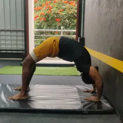 Consistent practice is key to improving your backbend. We guide you through the process safely to increase your range of motion over time.