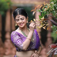 A full series showcasing a stunning purple lehenga with intricate silver work, styled for a Navratri theme.