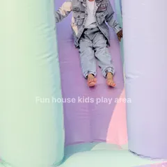 A child enjoying the gentle slide of our pastel bouncy. The soft, cushioned landing ensures a safe and fun experience every time.