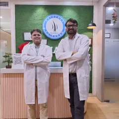 Here I am with my colleague, Dr. Manish Jangra. We believe in a team-based approach to provide comprehensive dermatological and hair restoration care at our Gurugram center.