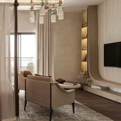 The seating area in this Zen-inspired bedroom features a custom TV unit with curved, organic lines and integrated shelving. The space is designed for rest and reflection, balancing grounding with grace.