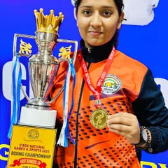 We don't just train, we build champions. Here is our star boxer, Prisha Pawar, with her gold medal and trophy from the CISCE National Games & Sports 2023, a testament to her hard work and our dedicated coaching.