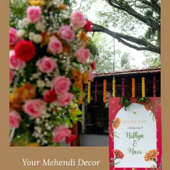 A personalized welcome sign for Nithya and Ravi's Mehendi, framed by vibrant florals, setting a warm and inviting tone for the celebration.
