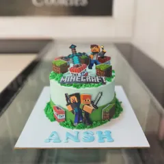 We built this Minecraft world entirely out of cake and fondant. It features popular characters and game elements like TNT blocks, making it the perfect birthday cake for a gamer.