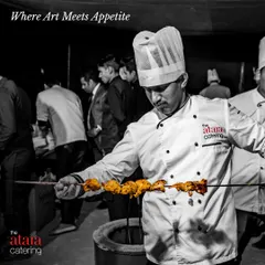 Where art meets appetite. This black and white shot captures one of our chefs skillfully preparing kebabs in a tandoor, highlighting the passion and artistry behind our food.