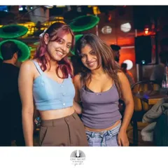 Friends enjoying the old school tunes. The energy of a retro night is infectious and always positive.
