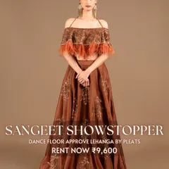 Be a 'Sangeet Showstopper' in this dance-floor-approved lehenga by Pleats. The off-shoulder top with feather details and the rich brown color make it a unique and fashionable choice for an evening of celebration.