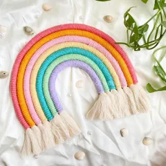 For those who love bright colors, this multi-colored rainbow is a burst of happiness! With eight vibrant arches, this large wall hanging makes a cheerful statement in any playroom or kid's bedroom.