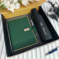 An elegant corporate gift in a beautiful forest green. The personalized diary and matching water bottle create a sophisticated and cohesive set.