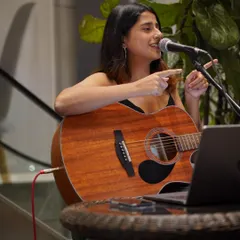 I tend to talk a lot on stage, sharing stories behind the songs. Here's a moment from a fun, interactive solo acoustic set at RCB Bar & Cafe.
