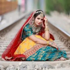 We took this Sabyasachi-style lehenga to a railway track for a unique editorial look. This shot shows how I use leading lines and an unusual environment to create a powerful and unconventional ethnic fashion photograph.