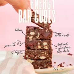Our Energy Bar Cubes are a triple threat: vegan, sugar-free, and absolutely delicious. They are made with dates, oats, peanuts, and refined sugar-free chocolate for a clean, energizing snack.