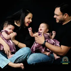 A candid moment of pure joy with a family and their twin girls. Capturing these happy, unscripted interactions is what makes a session special.